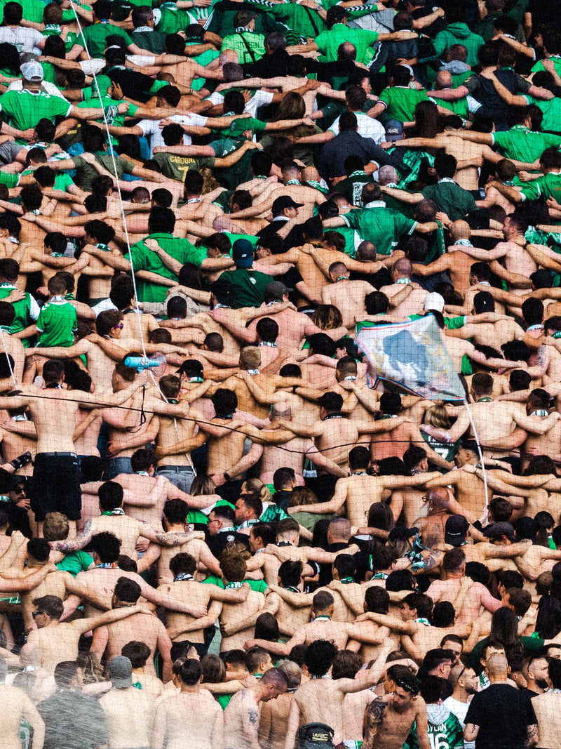 Away end packed with green and white supporters