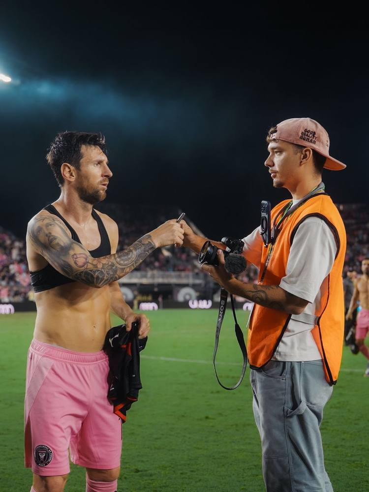 Pitchside moment with a player