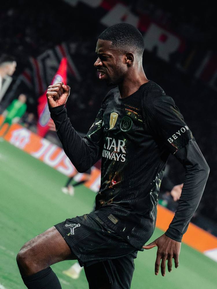 Player celebrating in front of the stand